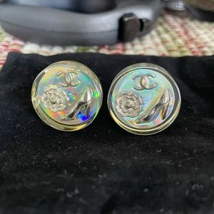 Vintage Chanel 1997 Holographic logo camellia clip on earrings